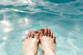Feet in a Pool during summer time