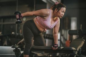 Women lifting weights at gym