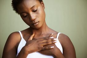 heart-health-belly-fat-hand-on-chest