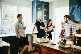 group of friends in kitchen