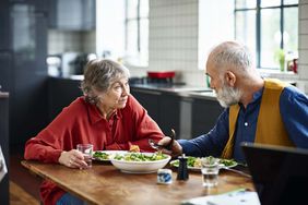 Senior couple having lunch at home meal delivery