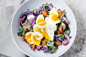 Fresh salad with soft boiled eggs 