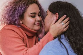 Tender embrace between a same-sex couple