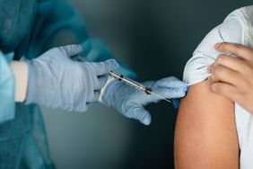 A close up shot of a vaccination procedure.