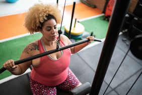 woman weight training in the gym